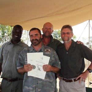 Lee-achieving-Senior-tracker,-2011,-with-George-Nkuna,-Alan-Yeowart-and-Adriaan-Louw